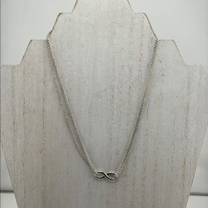 Tiffany & Co. 9.25 S Silver Infinity Elegant Necklace.